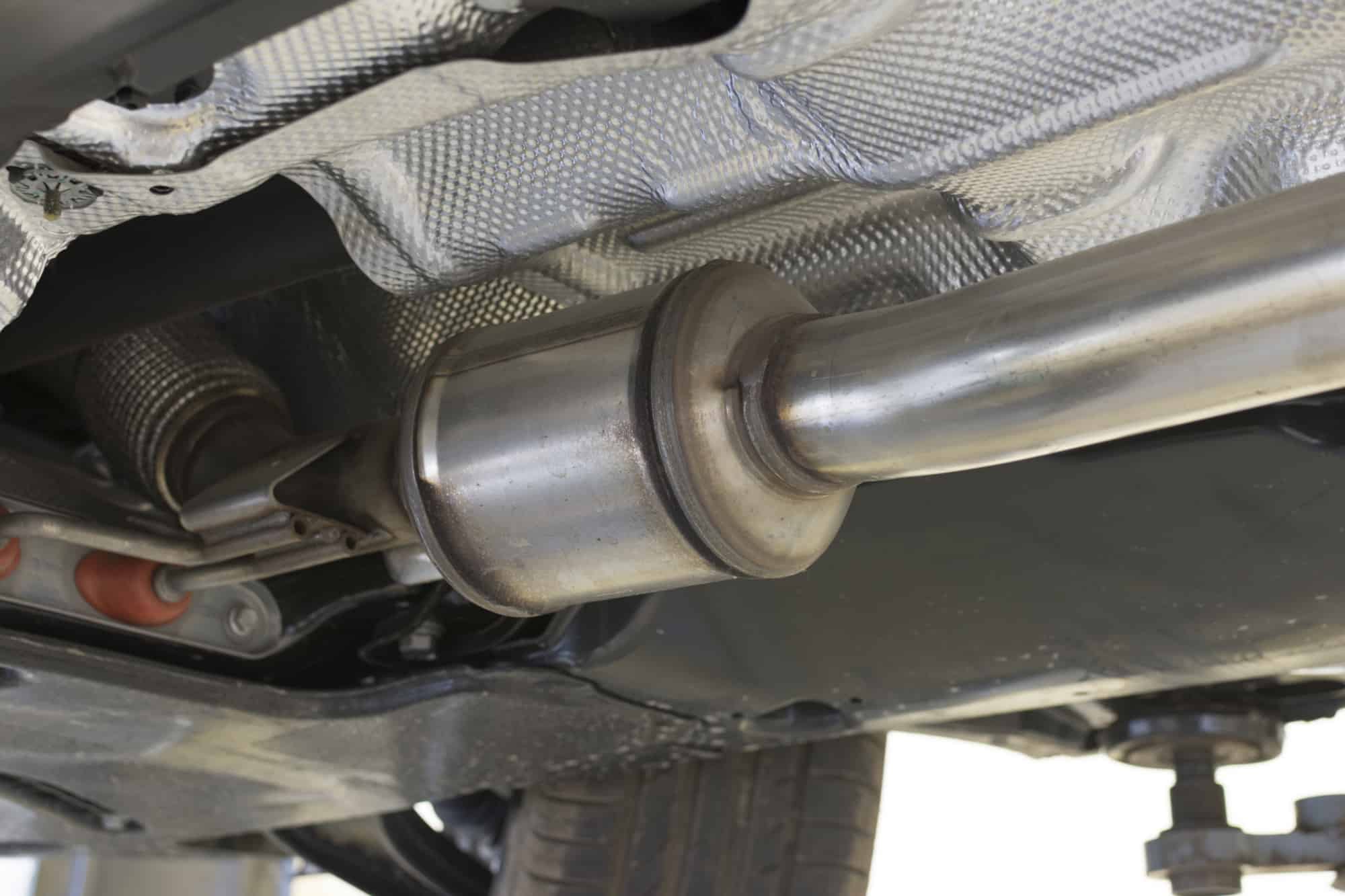Can a bad catalytic converter cause a car to overheat?